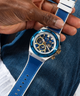 GW0713G1 GUESS Mens Blue 2-Tone Multi-function Watch lifestyle hand holding watch