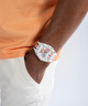 GW0720G1 Pride Limited Edition GUESS Mens White Rainbow Analog Watch lifestyle watch on wrist hand in pocket