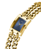 Gold chain GUESS Ladies Mod Heavy Metal Gold Tone Analog Watch with blue face on a white background lifestyle