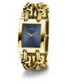 Gold GUESS Ladies Mod Heavy Metal Gold Tone Analog Watch with blue face and 'Guess' branding on a white background
