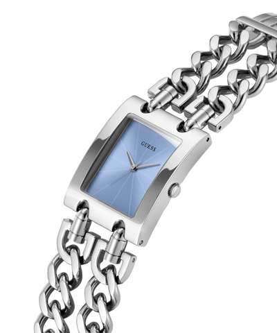Silver chain watch with blue face on a white background lifestyle