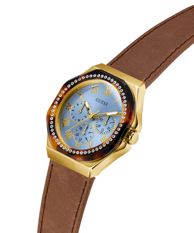 GUESS Ladies Brown Gold Tone Multi-function Watch with a brown strap on a white background lifestyle