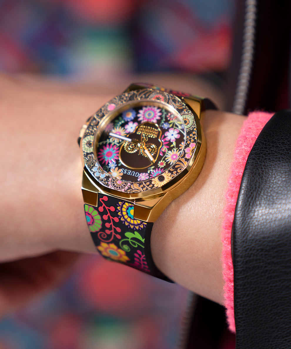 GW0754L1 GUESS Ladies Day of the Dead Black Gold Tone Analog Watch angle watch on wrist