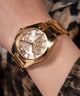 GW0760L2 GUESS Ladies Gold Tone Multi-function Watch watch on wrist