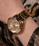 GW0760L2 GUESS Ladies Gold Tone Multi-function Watch watch on model