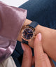 GW0761L2 GUESS Ladies Blue Rose Gold Tone Analog Watch watch on wrist