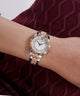 GW0765L2 GUESS Ladies 2-Tone Analog Watch watch on arm