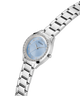 Silver watch with a light blue face on a white background lifestyle