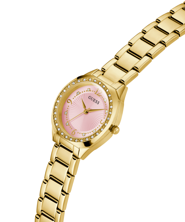 Gold watch with a pink face on a white background lifestyle