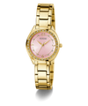 GUESS Ladies Gold Tone Analog Watch with a pink face on a white background