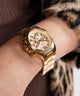 GW0769L2 GUESS Ladies Gold Tone Multi-function Watch watch on arm