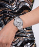 GW0777L1 GUESS Ladies Silver Tone Multi-function Watch watch on arm