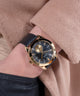 GW0793G2 Guess Mens Black Gold Tone Multi-function Watch watch on wrist