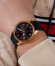 GW0805G2 GUESS Mens Black Gold Tone Analog Watch watch on model