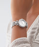 GW0838L1 GUESS Ladies Silver Tone Analog Watch watch on wrist