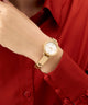 GW0856L1 GUESS Limited Edition Lunar New Year Ladies Gold Tone Analog Watch angle watch on wrist