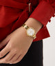 GW0856L1 GUESS Limited Edition Lunar New Year Ladies Gold Tone Analog Watch watch on model