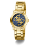 Gold GUESS Ladies Gold Tone Analog Watch with blue dial featuring a logo on a white background