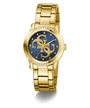 Gold GUESS Ladies Gold Tone Analog Watch with blue dial featuring a logo on a white background