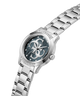 A Guess women's stainless steel watch with a silver-tone metal link bracelet, a round silver case accented with small clear crystals, and a dark gray dial featuring the Guess logo. lifestyle