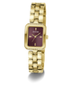 A gold-tone Guess watch with a rectangular maroon dial and a matching gold-tone link bracelet, shown on a clean white background.