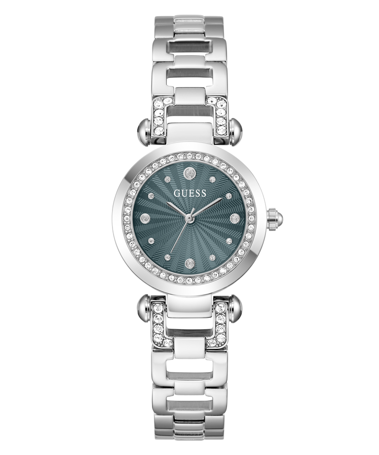 A Guess women's analog watch with a silver-tone metal link bracelet, a bezel encrusted with clear crystals, and a textured dark teal-green dial.