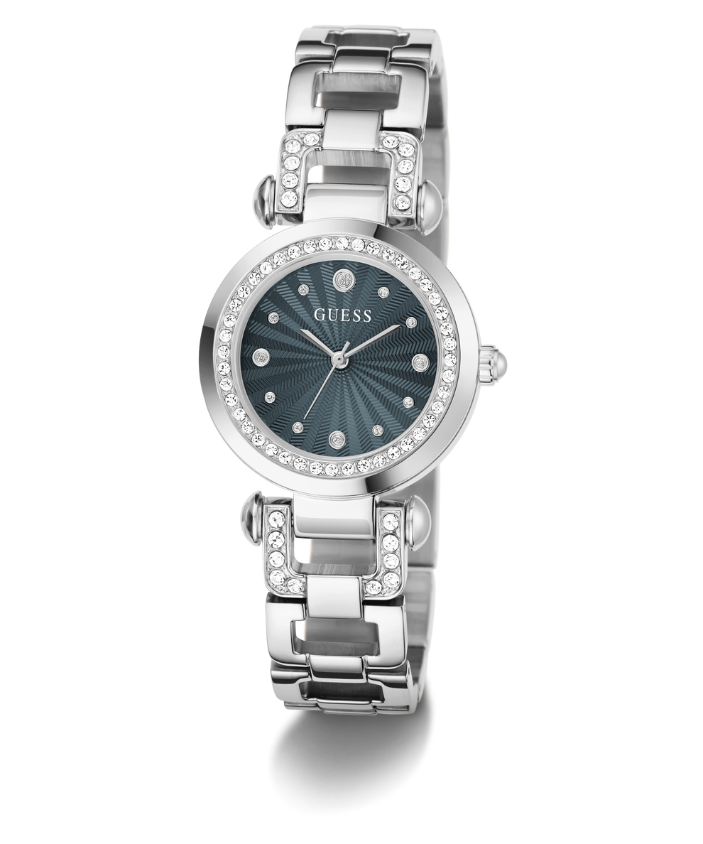 A GUESS women's watch featuring a silver-tone metal link bracelet with crystal accents, a round silver bezel, and a dark blue sunburst dial.