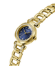 Gold-tone Guess women's watch with a blue sunburst dial, crystal-encrusted bezel and link details, shown on a plain white background. lifestyle