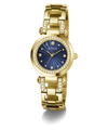 Gold-tone Guess watch with a blue sunburst dial, crystal-studded bezel and bracelet links, shown on a white background.