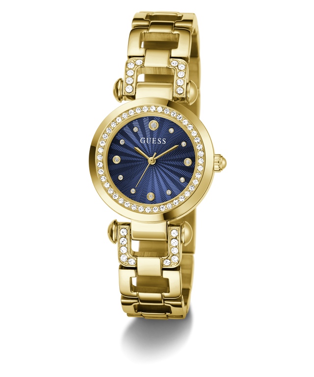 Gold-tone Guess watch with a blue sunburst dial, crystal-studded bezel and bracelet links, shown on a white background.