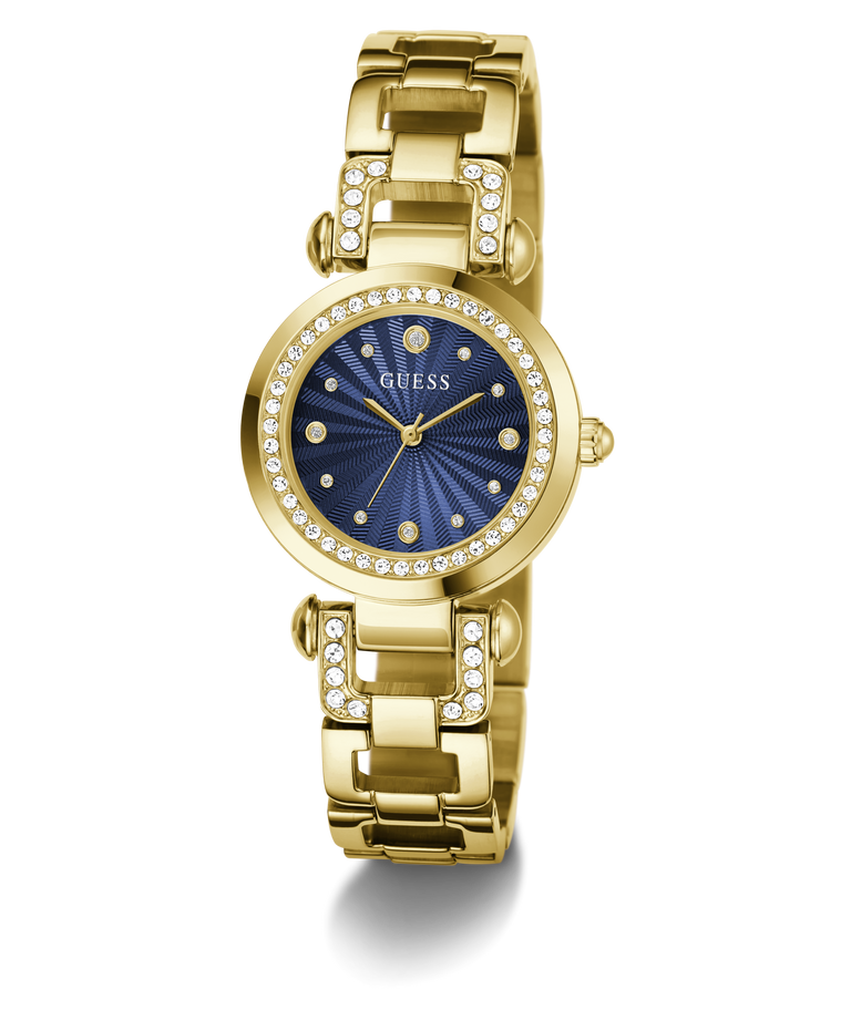 Gold-tone Guess watch with a blue sunburst dial, crystal-studded bezel and bracelet links, shown on a white background.