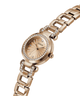 Gold watch with diamond-studded face on a white background lifestyle