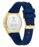 Guess watch with blue strap and gold caseback on a white background
