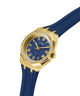 Gold and blue watch with a white background lifestyle