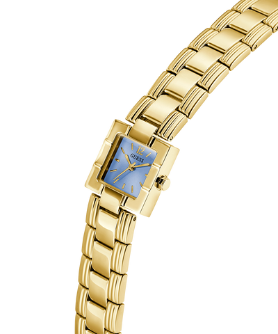 Gold watch with a blue face on a white background lifestyle