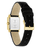 caseback of GUESS Ladies Black Gold Tone Analog Watch