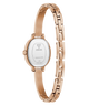 Rose gold GUESS Ladies Rose Gold Tone Analog Watch with visible brand logo on a white background