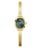 A gold-tone women's wristwatch with a slim bangle-style strap, an oval case, and a dark green dial featuring the GUESS logo and small hour markers.