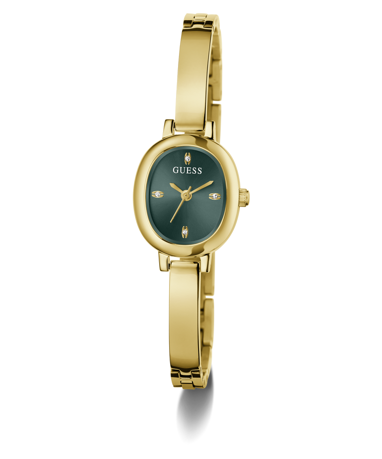 A gold-tone women's bangle watch by Guess with an oval green dial and matching green bezel, shown on a clean white background.