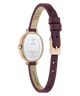GUESS Ladies Red Rose Gold Tone Analog Watch caseback with purple strap on a white background