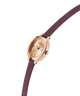 GUESS Ladies Red Rose Gold Tone Analog Watch with a purple strap on a white background lifestyle