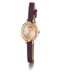 GUESS Ladies Red Rose Gold Tone Analog Watch with rose gold case and purple strap on a white background