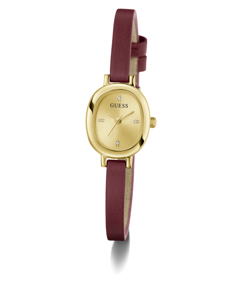 A GUESS women's watch featuring an oval gold-tone case, a gold dial with crystal hour markers, and a dark burgundy leather strap, shown against a plain white background.