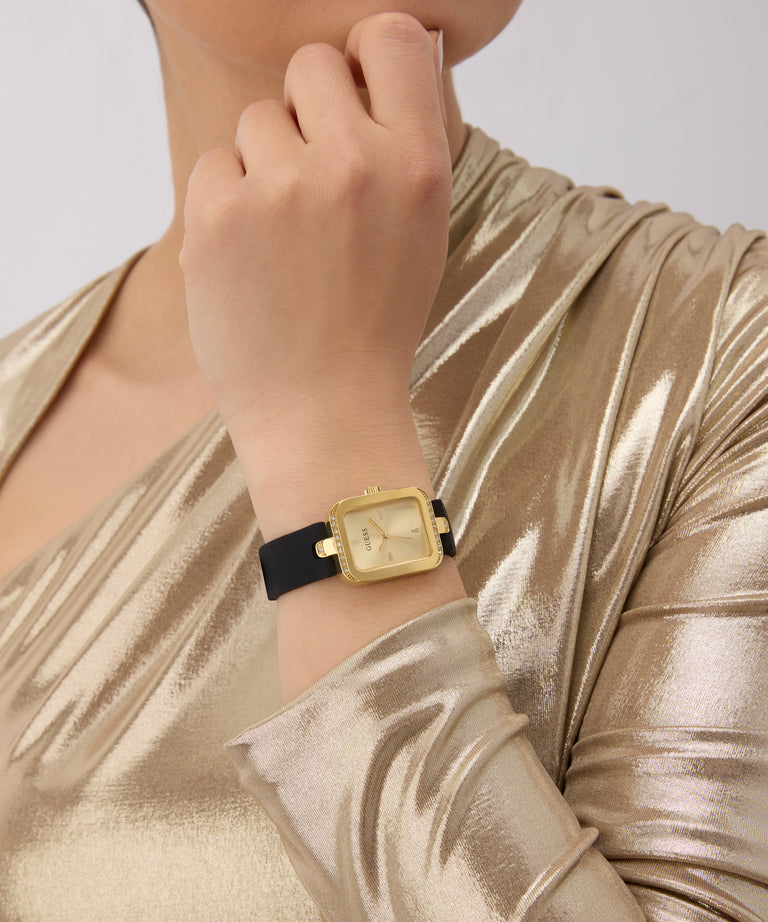 Gold watch on a wrist with a person wearing a gold dress against a neutral background GW0926L2