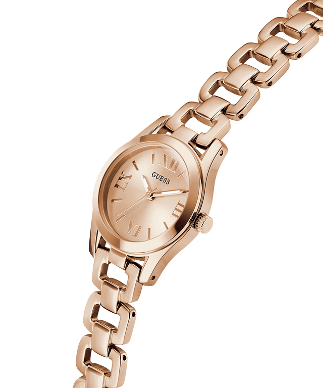 Rose gold watch with chain strap on a white background lifestyle
