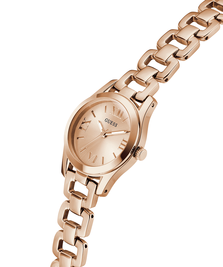 Rose gold watch with chain strap on a white background lifestyle
