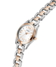 Two-tone watch with silver and rose gold band on a white background lifestyle