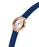Guess watch with blue strap and rose gold case on white background lifestyle