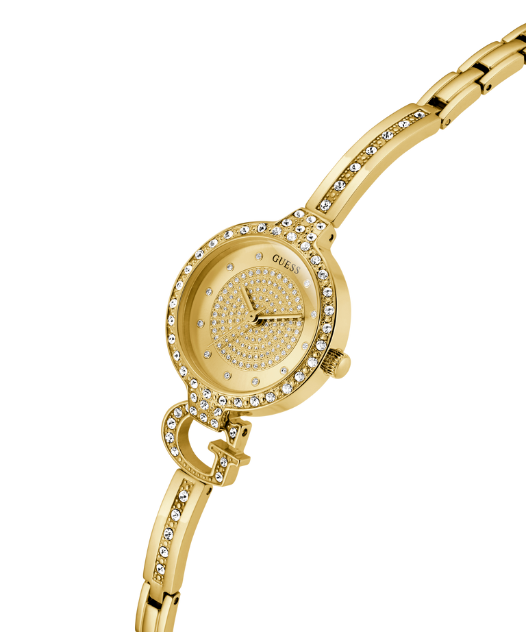 Gold watch with gemstone accents on a white background lifestyle