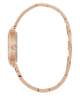Side of GUESS Ladies Rose Gold Tone Analog Watch with a white background